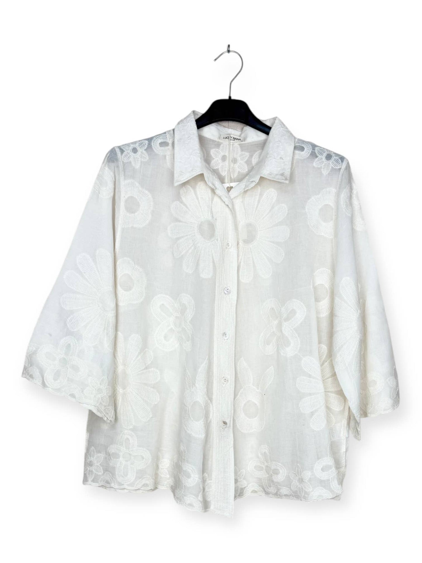 - Floral embroidered shirt