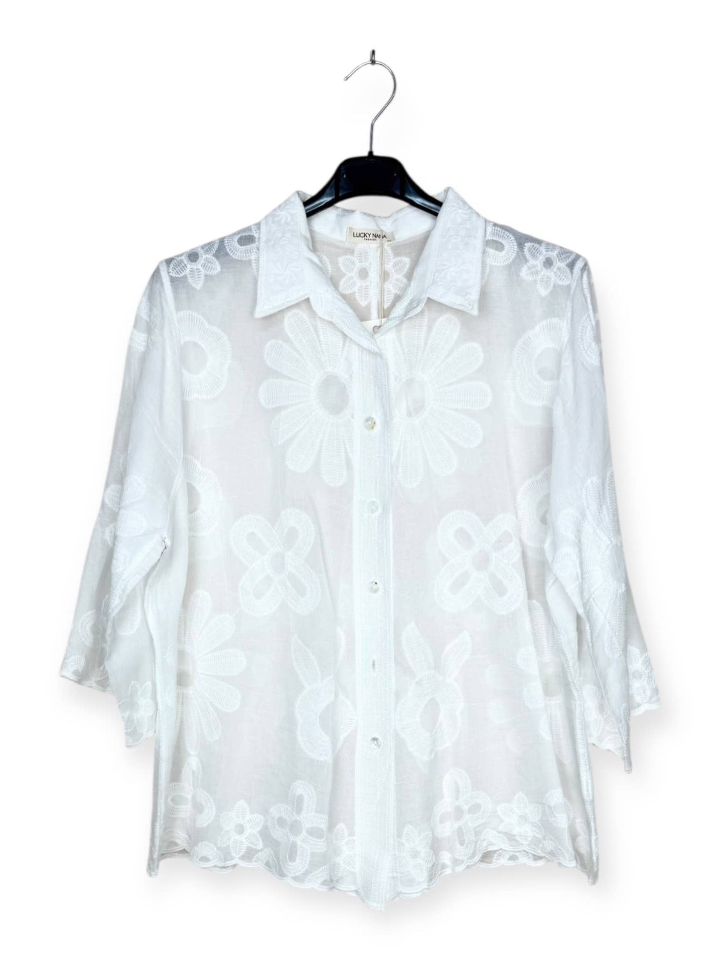 - Floral embroidered shirt