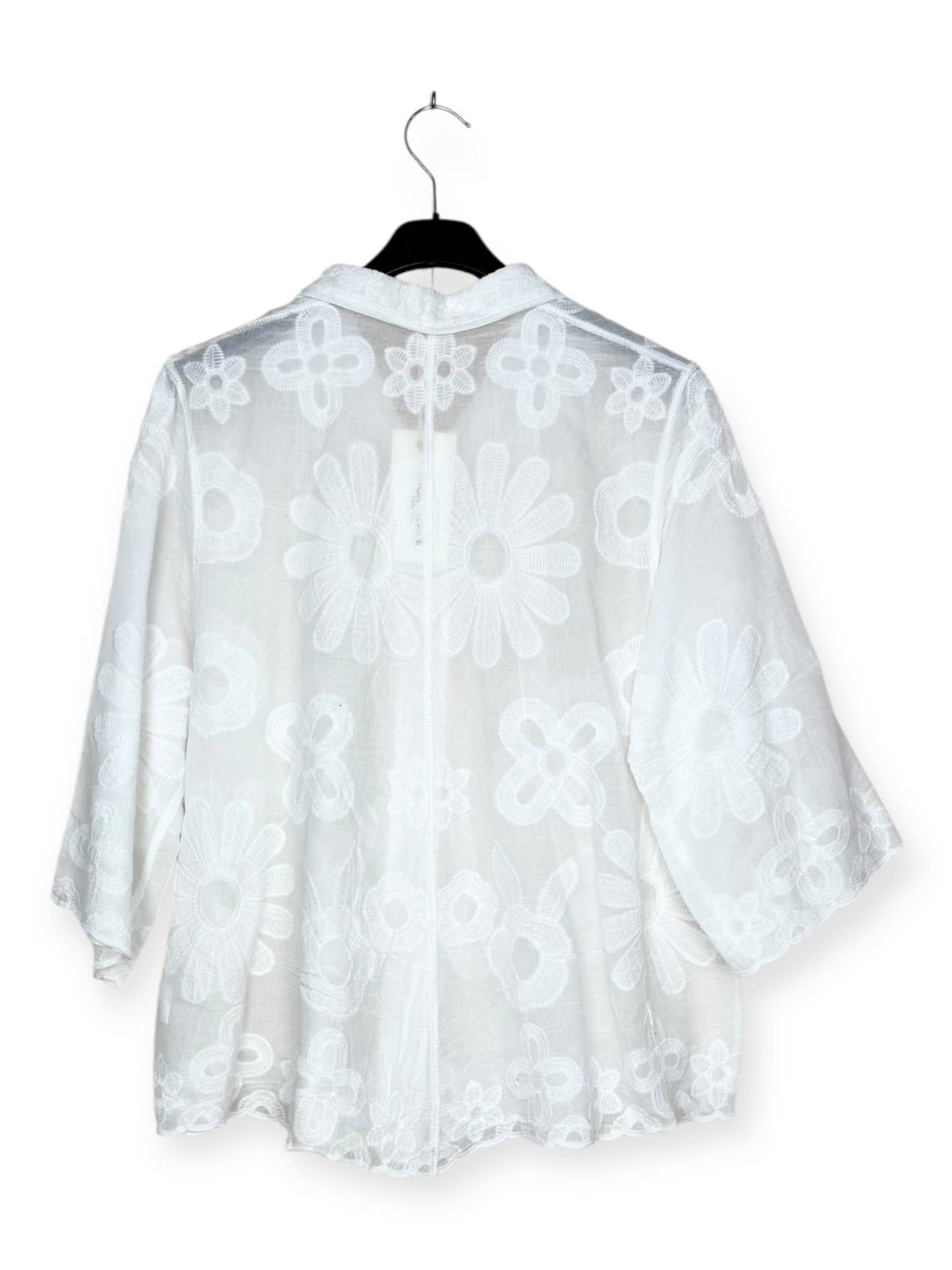 - Floral embroidered shirt