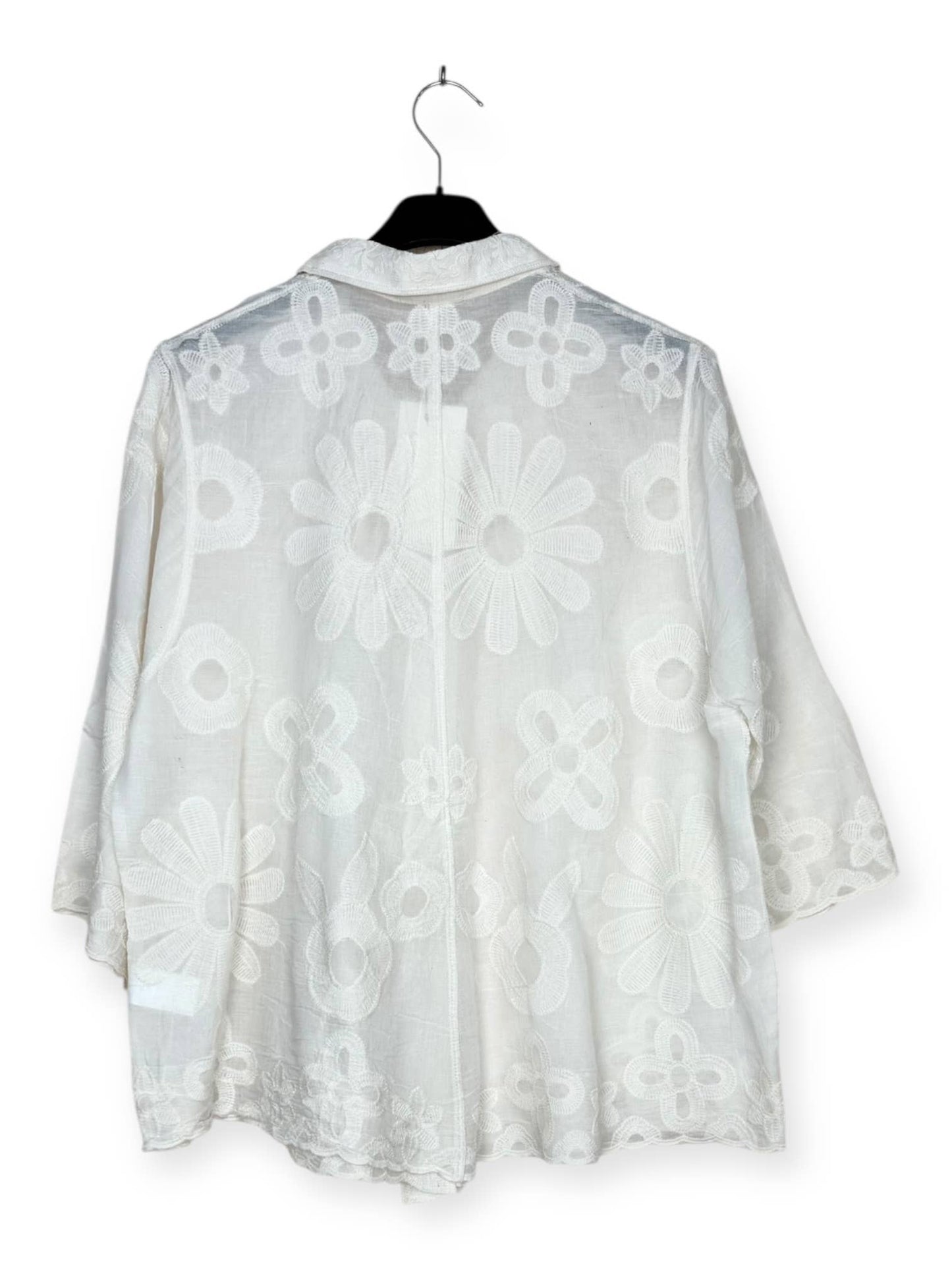 - Floral embroidered shirt
